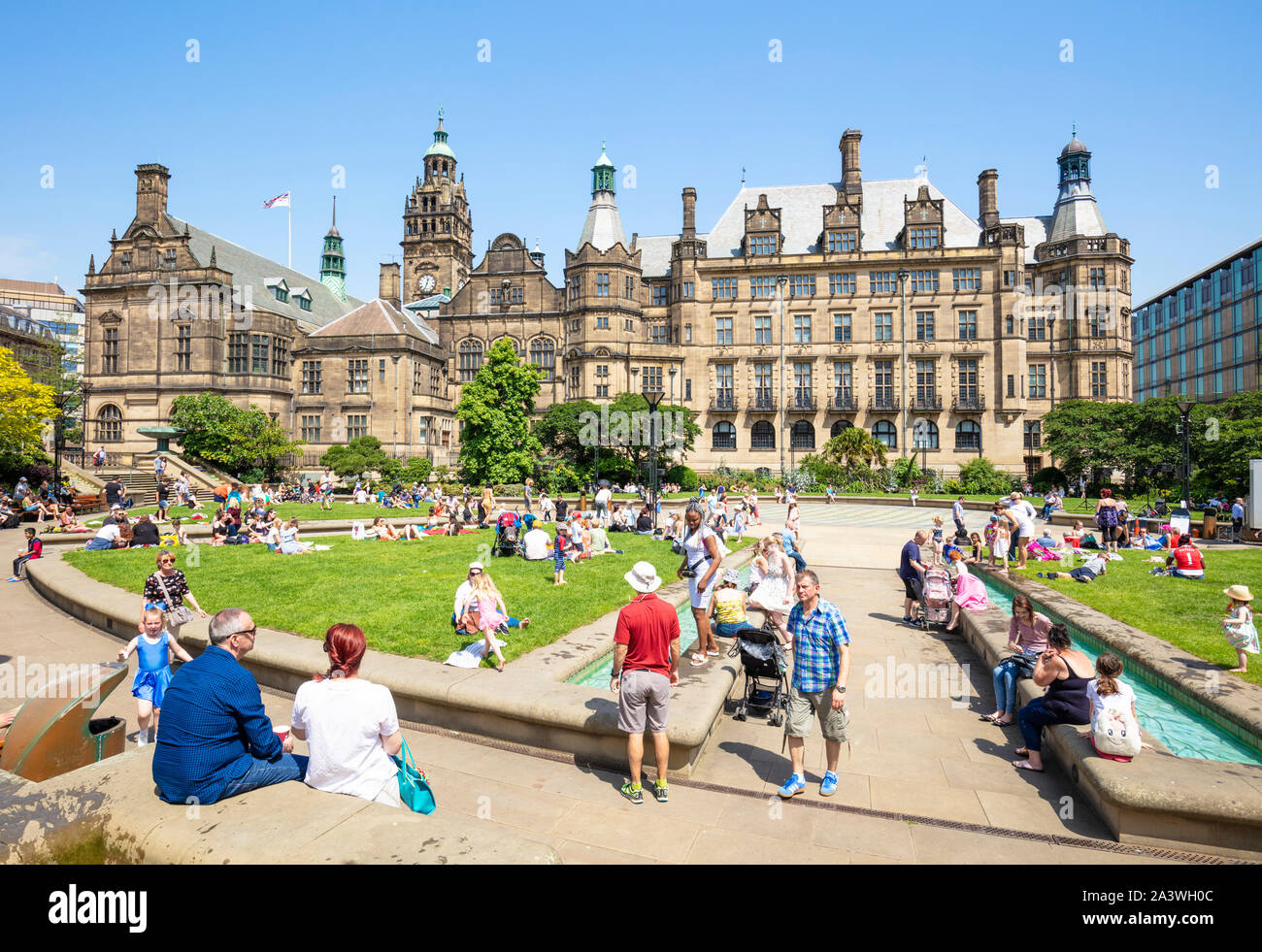 Sheffield city centre town hall and lots of people in the Peace gardens Sheffield city center south yorkshire england gb uk europe Stock Photo