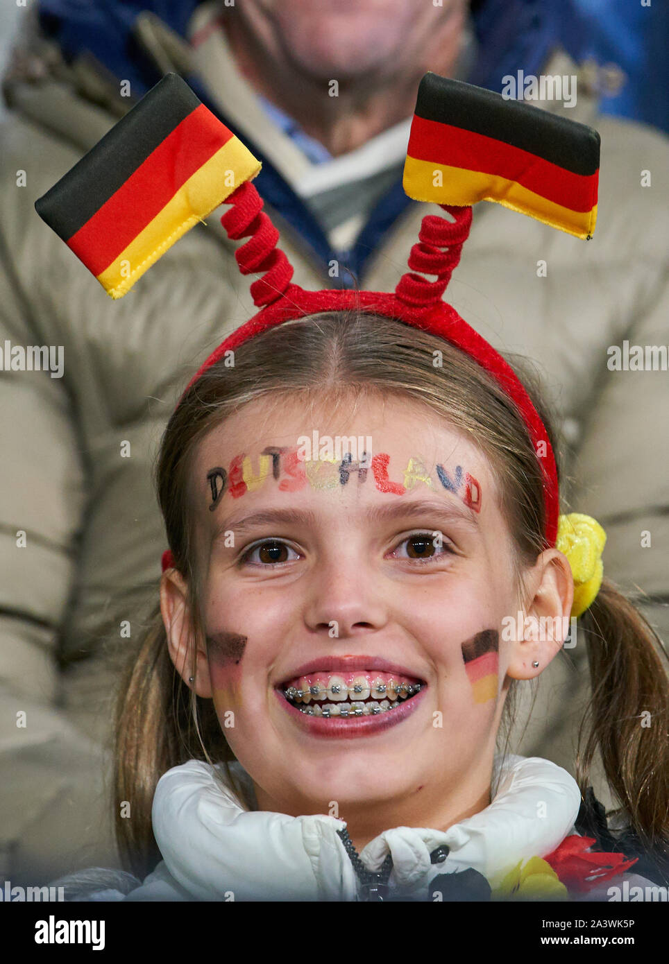 Germany- Argentina, Soccer, Dortmund, October 09, 2019 Fan, young girl with make-up and brace GERMANY - ARGENTINA 2-2 friendly match,  German Football National team, DFB , Season 2019/2020,  October 09, 2019 in Dortmund, Germany. © Peter Schatz / Alamy Live News Stock Photo