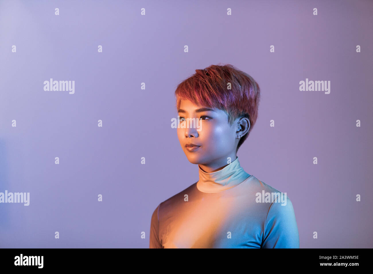 Creative shot of futuristic asian young adult Stock Photo