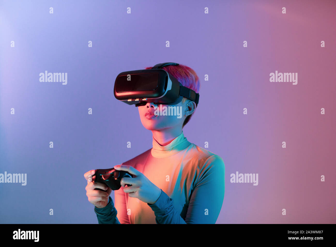 Creative shot of young adult using VR Stock Photo