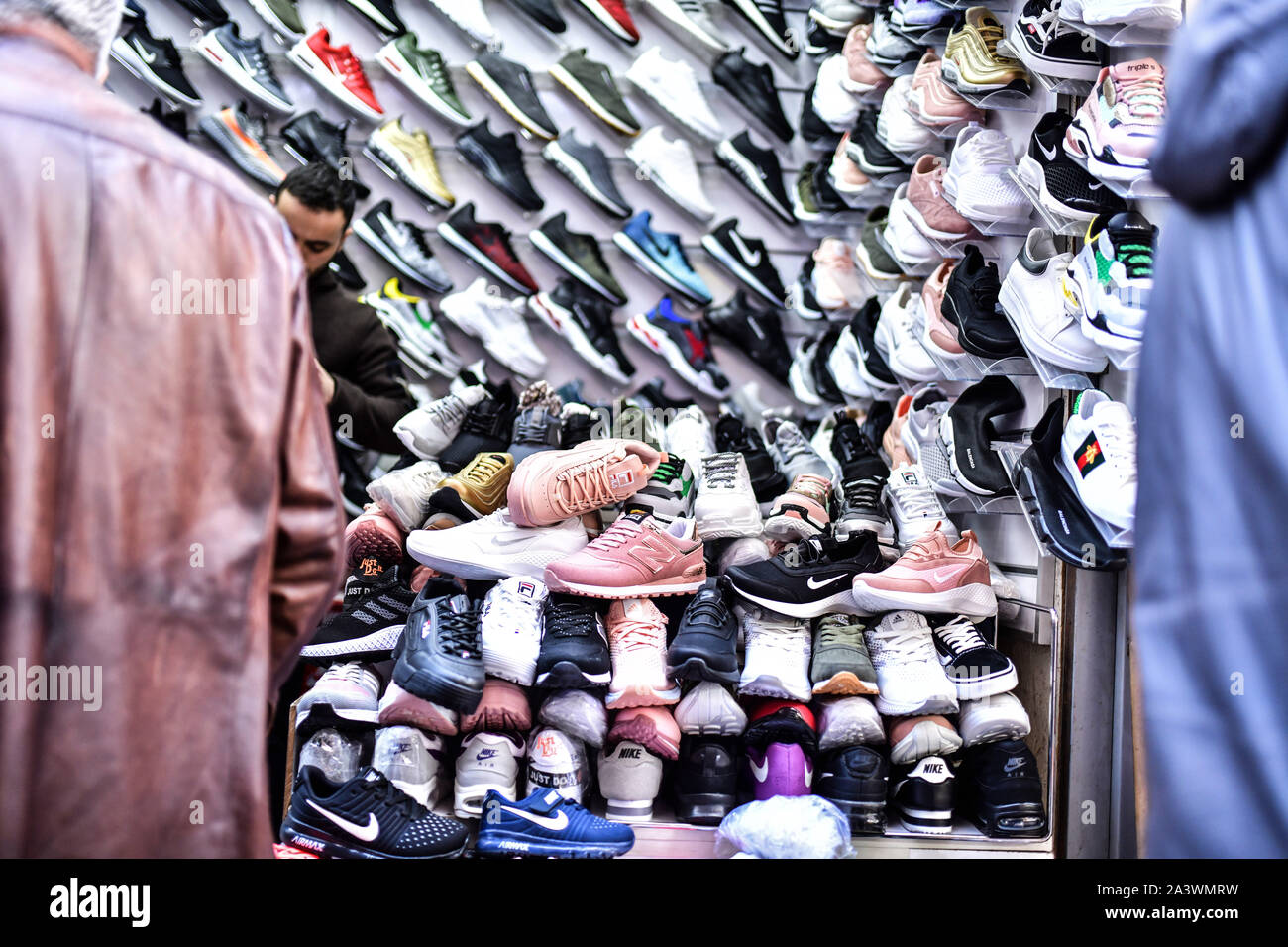 Turkey: Istanbul. Underground passage at the bottom of the Galata Bridge.  Numerous clothing and shoe shops and a place of sale for many counterfeits  Stock Photo - Alamy