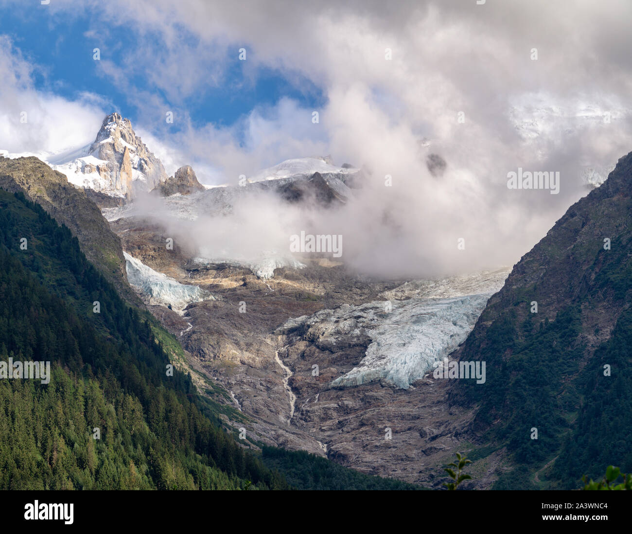 Mont Blanc massif, Alps, France. Mountains and glaciers in the clouds ...