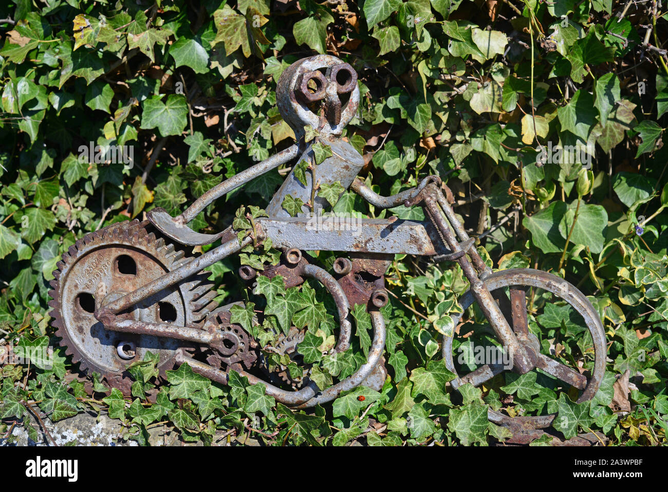 roadside heath robinson style sculpture of figure riding motor bike united kingdom Stock Photo