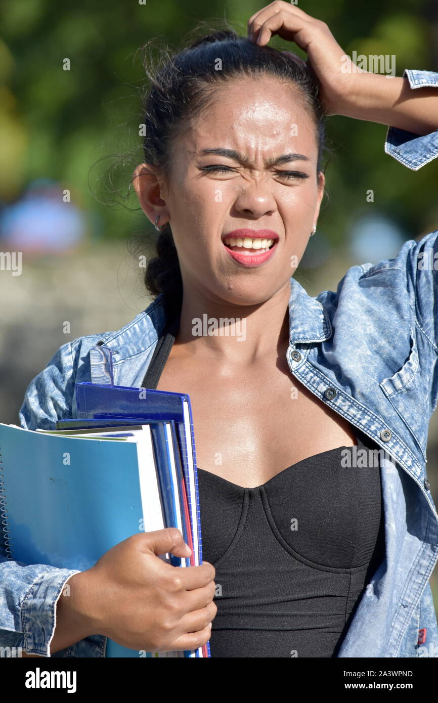Confused Filipina Student Adult Stock Photo
