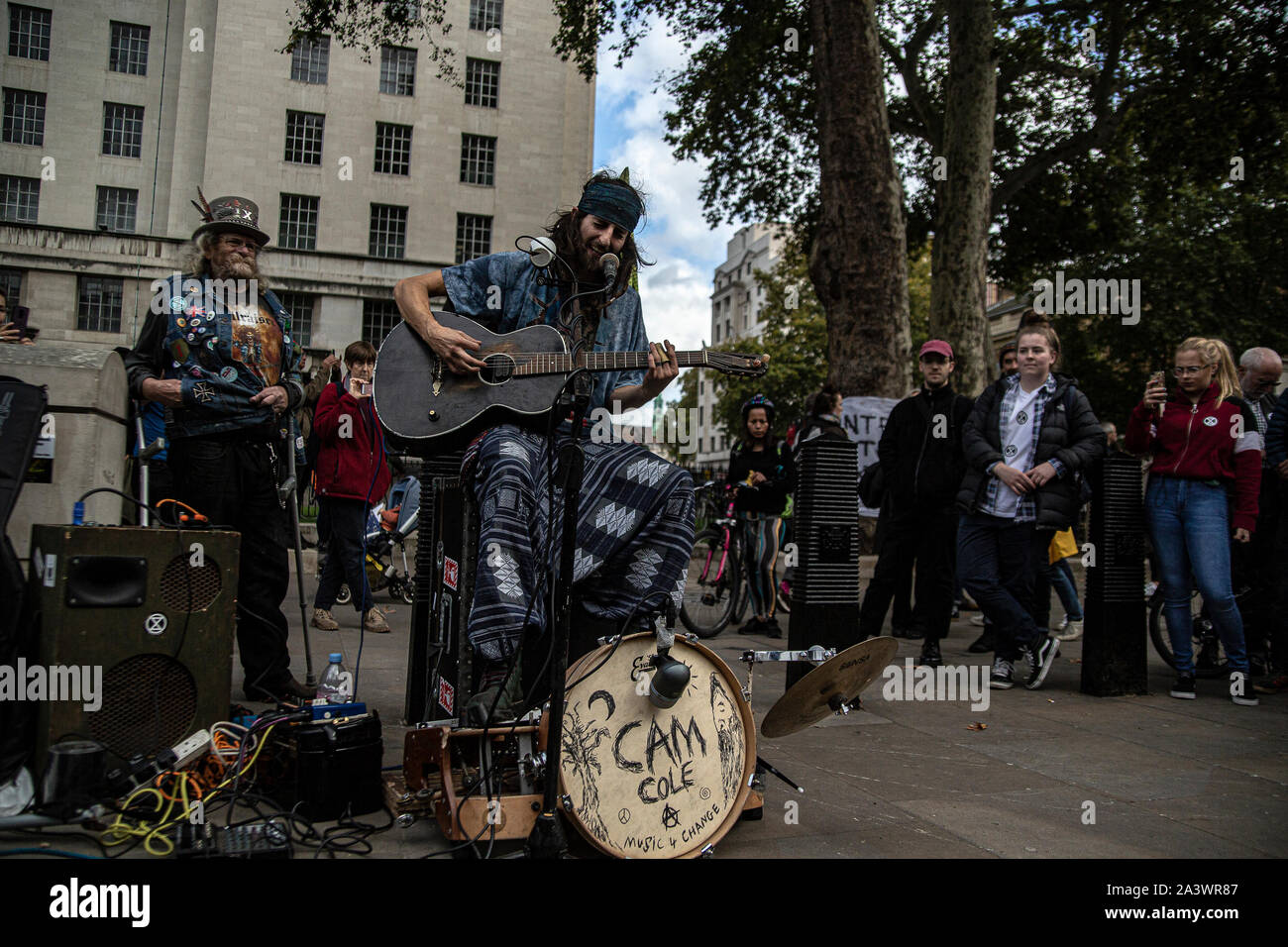 A man performs during the protest.Protesters took to the street in central London across this week and next week to highlight the 'climate emergency' facing the planet. Stock Photo