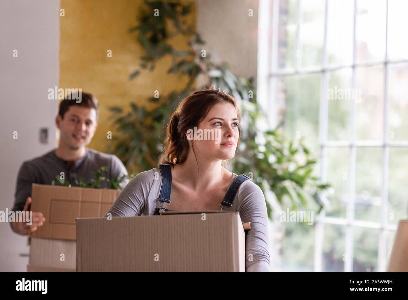 Couple moving into a new home Stock Photo