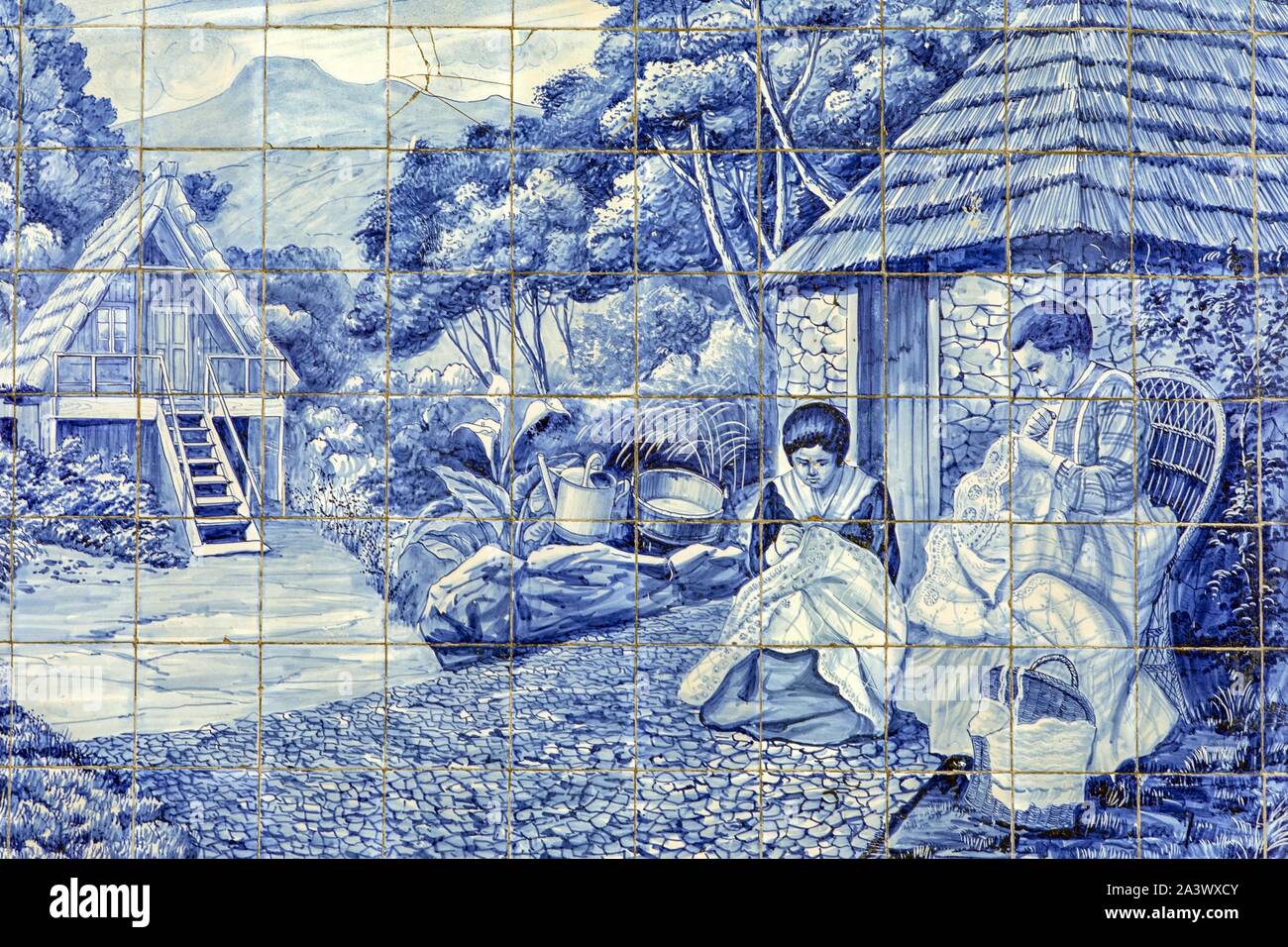 AZULEJOS OF EMBROIDERERS IN FRONT OF THEIR HOUSE IN THEIR SMALL VILLAGE, TRADITIONAL BORDAL EMBROIDERY,  FUNCHAL, ISLAND OF MADEIRA, PORTUGAL Stock Photo