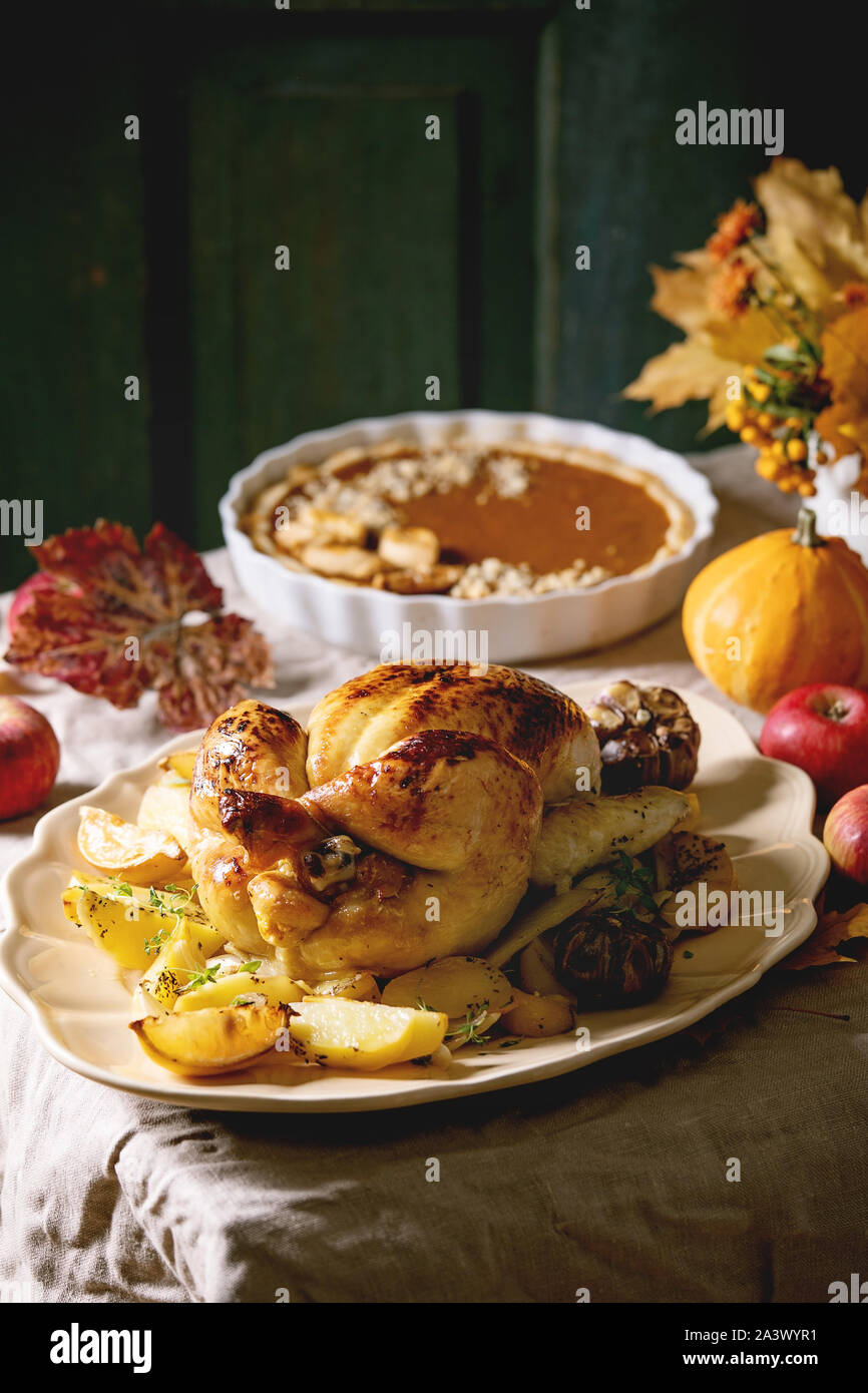 Baked chicken with potatoes Stock Photo - Alamy
