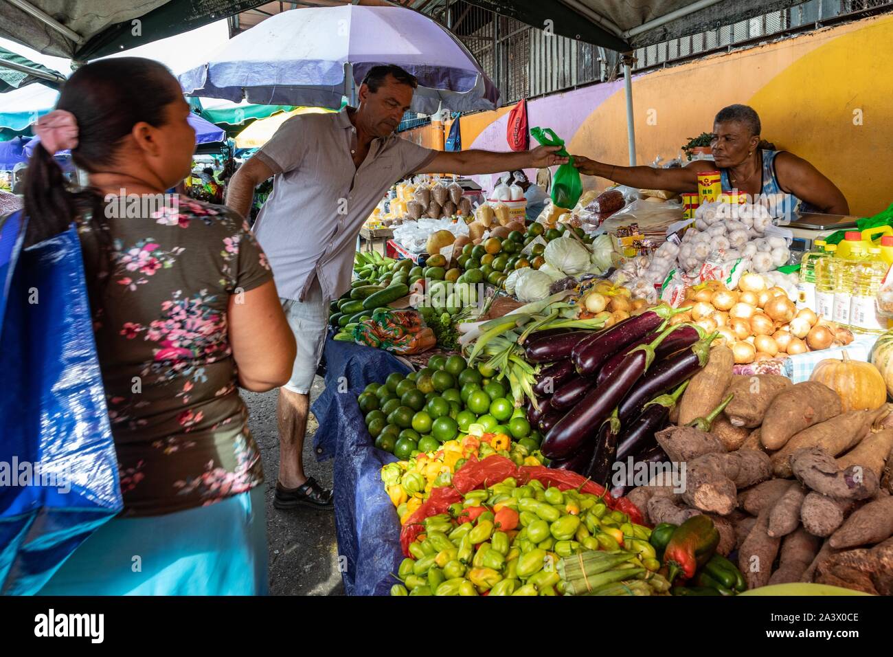 FRUIT AND VEGETABLE STALL, HMONG VENDOR IN THE MARKET OF CAYENNE, FRENCH GUIANA, OVERSEAS DEPARTMENT, SOUTH AMERICA, FRANCE Stock Photo