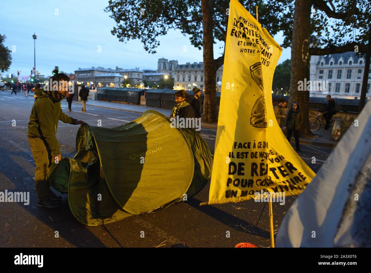 *** STRICTLY NO SALES TO FRENCH MEDIA OR PUBLISHERS *** October 07, 2019 - Paris, France: Activists from  Extinction Rebellion set up a small camp where they prepare to spend the night to enforce a blockade of Place du Chatelet in central Paris as part of their global environment protest movement. Stock Photo