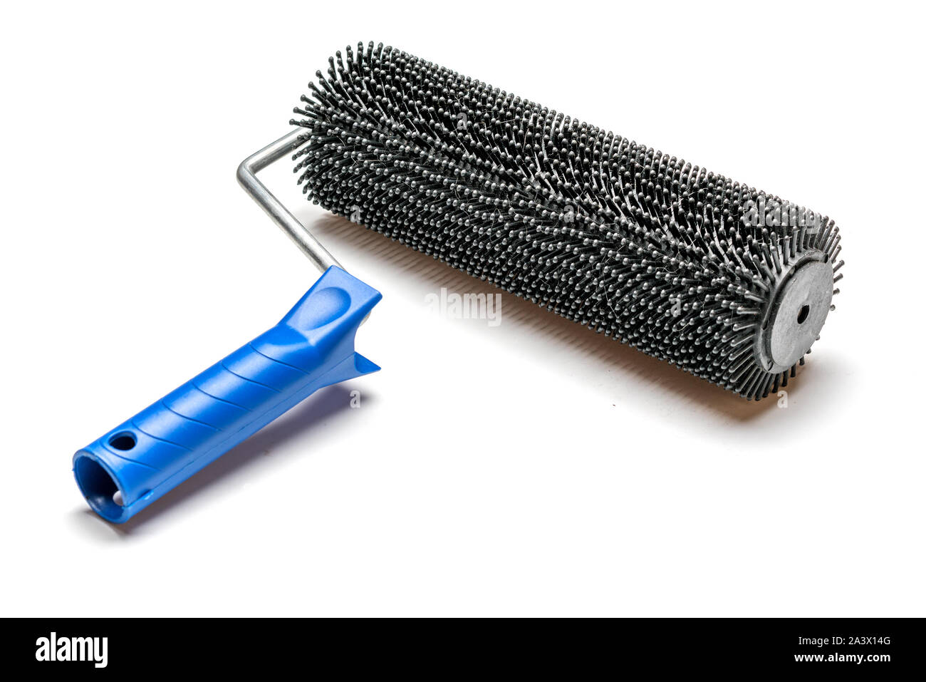 Needle roller for bulk floor on white background. Stock Photo