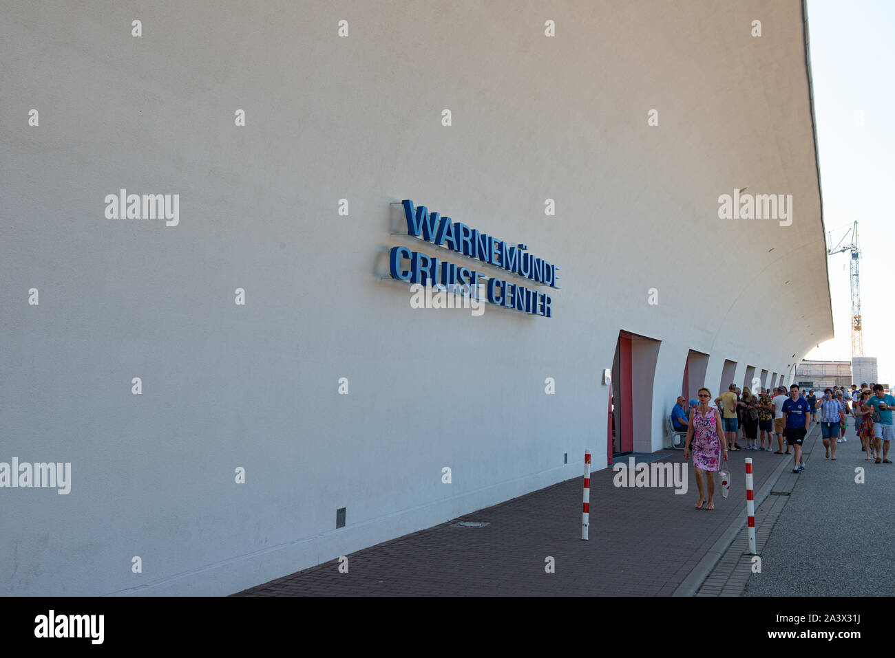 Cruise Passengers Walking To The City From The Cruise Centre Port In Warnemunde Stock Photo Alamy