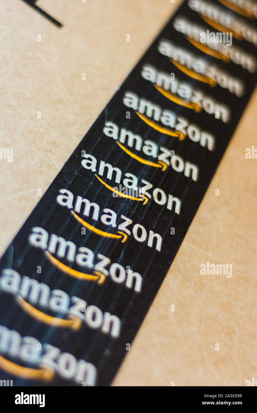 Monterrey, Mexico - Sept 3,0 2019: Amazon standard shipping box. Amazon logotype printed on cardboard box security scotch tape. Diagonal View Stock Photo