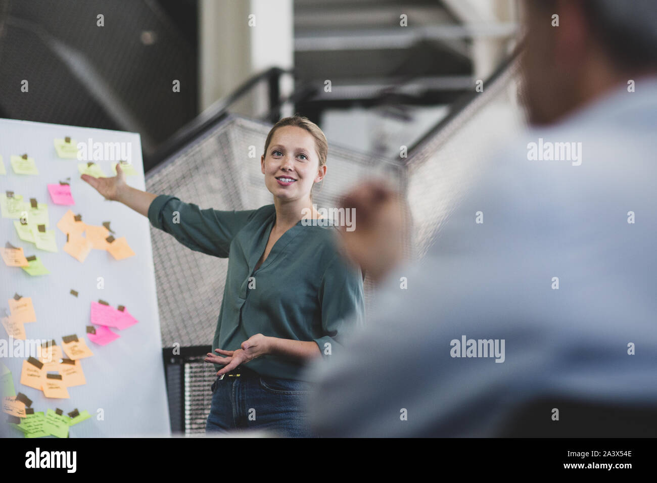 Female executive holding a brainstorm meeting Stock Photo
