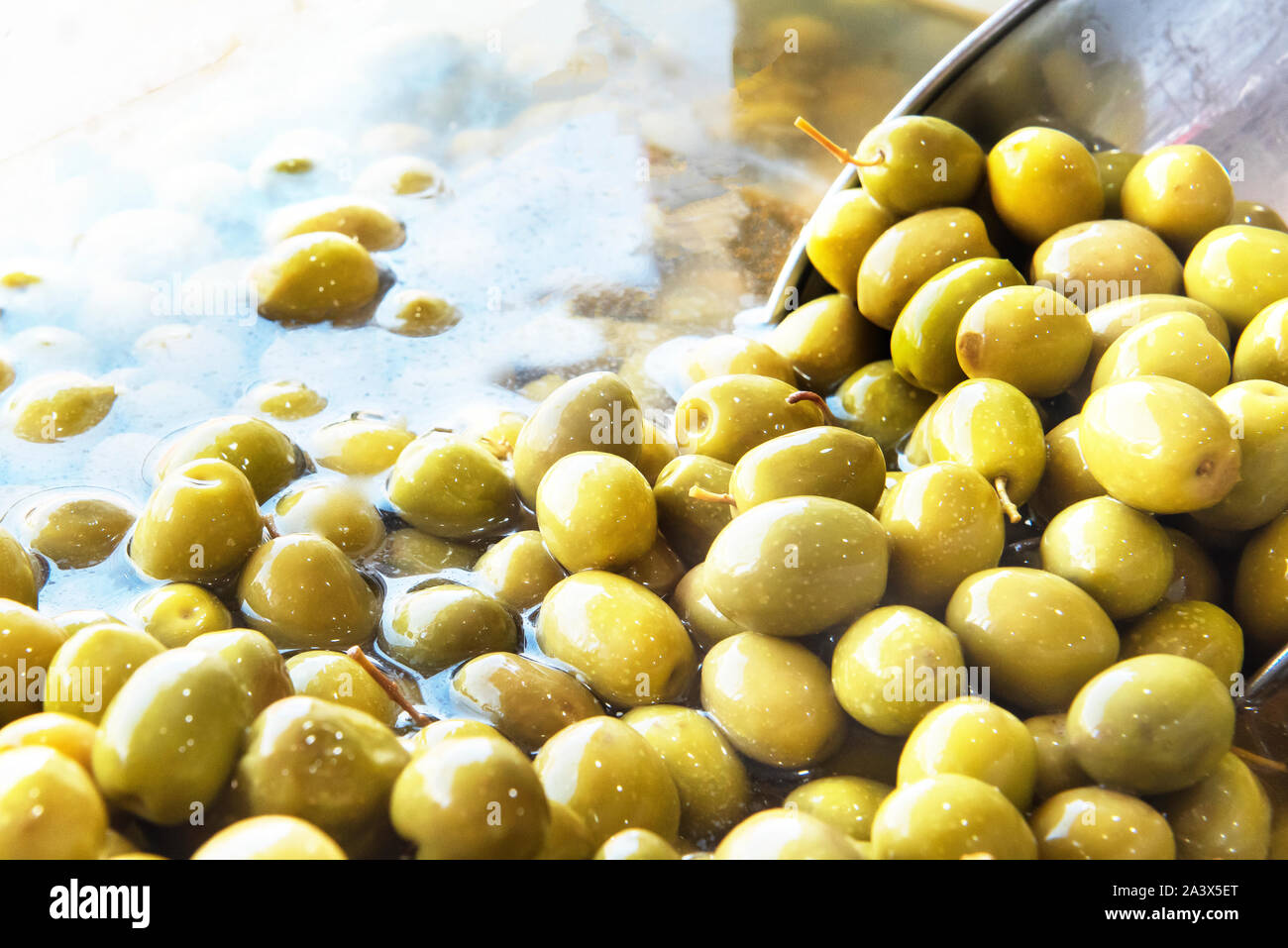 Green olives in brine, Iran Stock Photo Alamy
