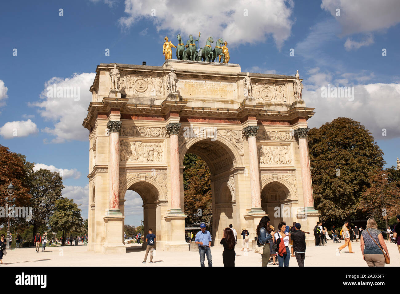 triumphal arch in paris (arc de triomphe du carrousel) between the