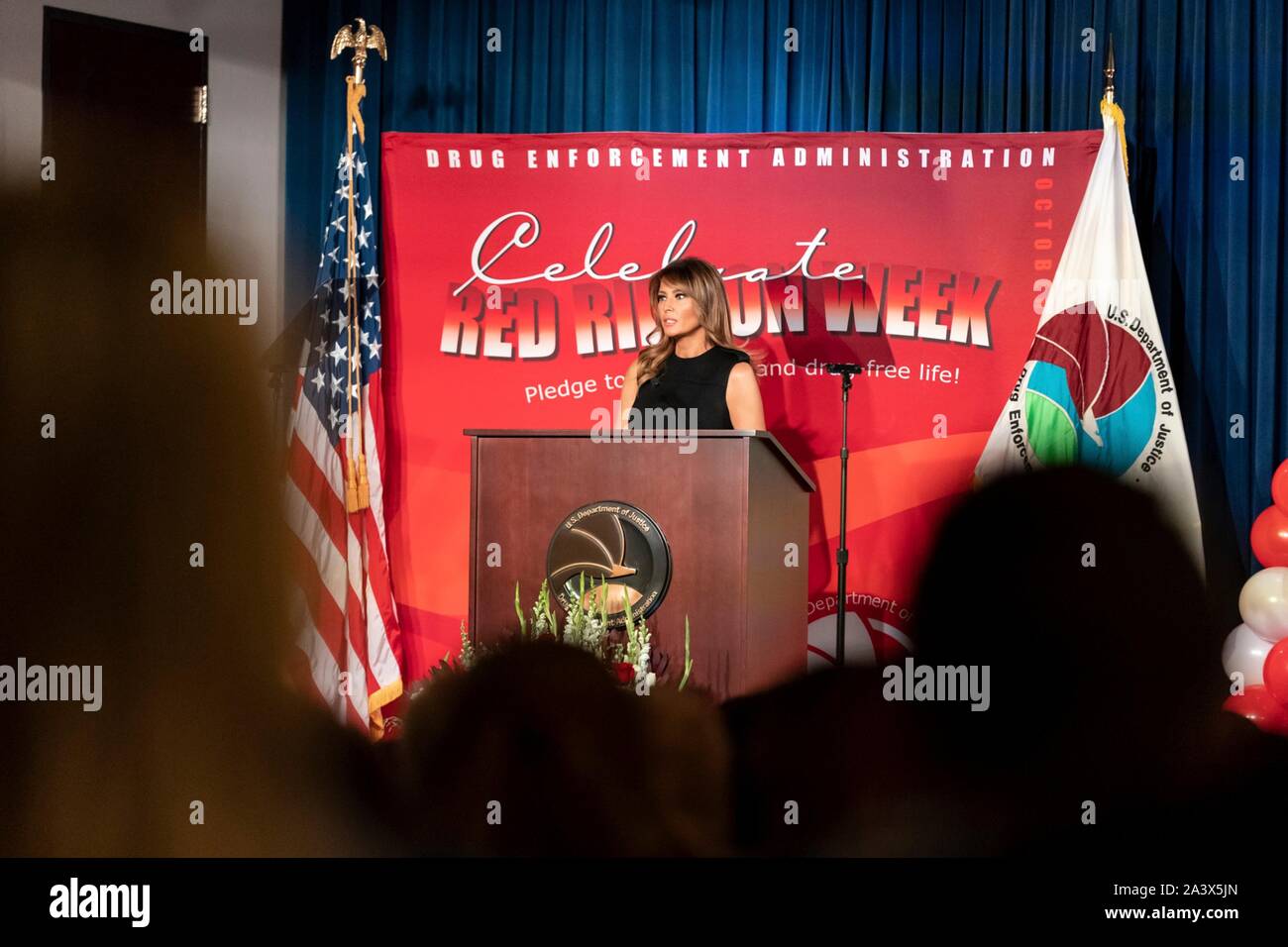 U.S First Lady Melania Trump delivers remarks during the National Red Ribbon Rally at the Drug Enforcement Agency Headquarters October 7, 2019 in Washington, DC. Stock Photo
