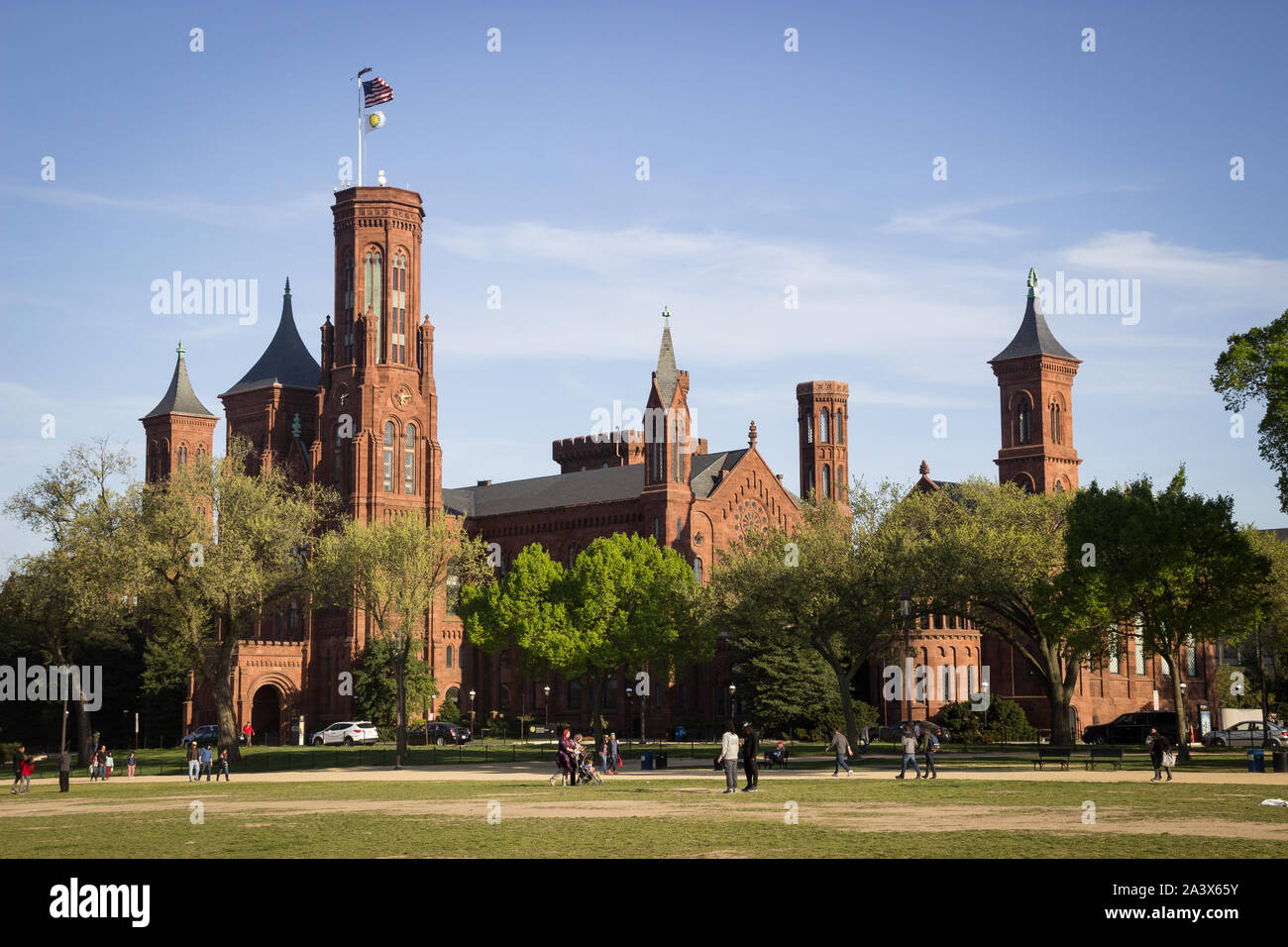 Smithsonian Institution Building and Castle - a wide view of the historic sandstone building from the National Mall. Stock Photo