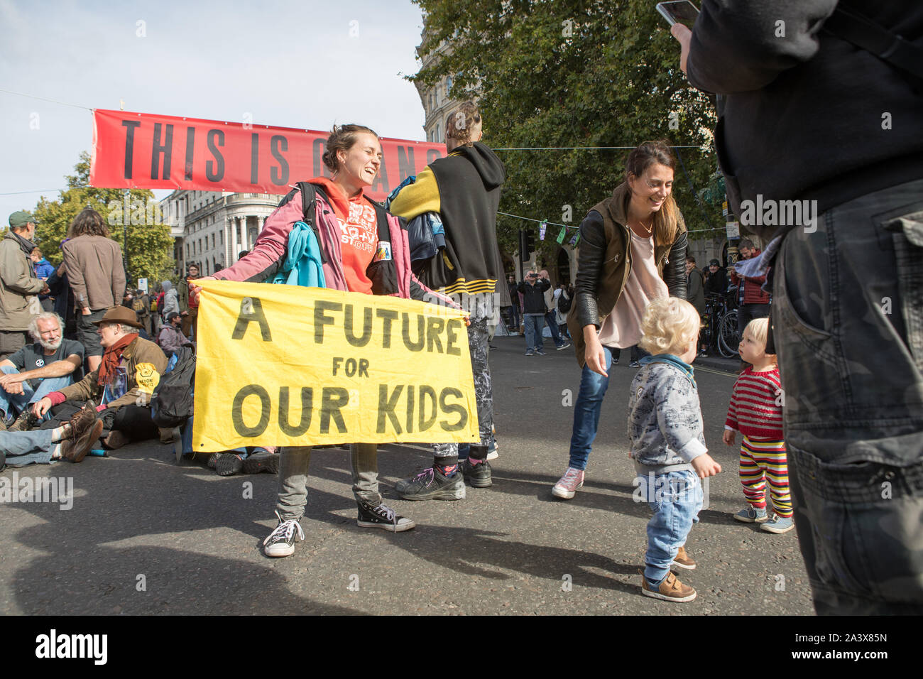 Westminster, London, UK. 10 October 2019. Environmental campaigners Extinction Rebellion have started two weeks protests from 7th to 20th October in and around London to demonstrate against climate change. The protesters in Trafalgar Square demand decisive action from the UK Government on the global environmental crisis. Stock Photo