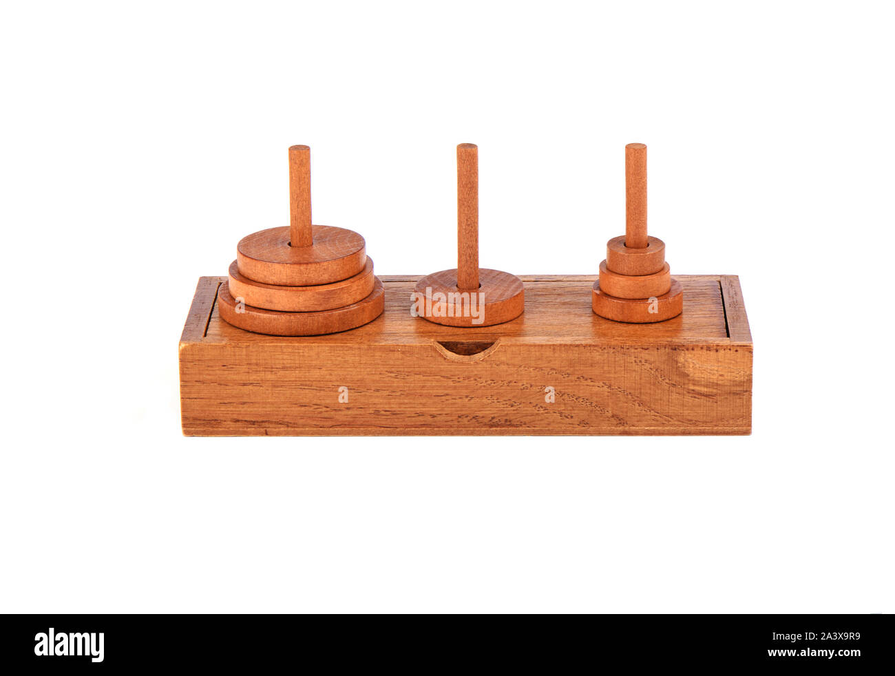 Wooden puzzle tower of hanoi over white background. Some kind of position.  Puzzle concept Stock Photo - Alamy