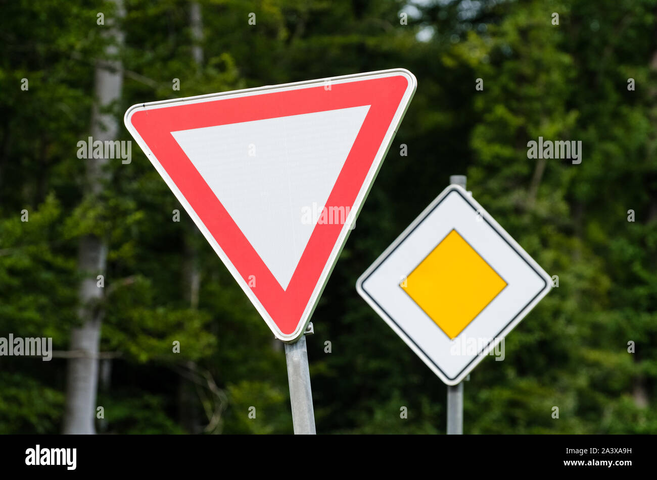 Street sign give way in Germany Stock Photo