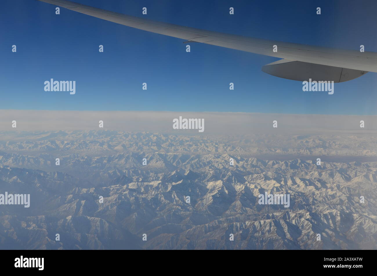 The view of the mountains from the plane Stock Photo