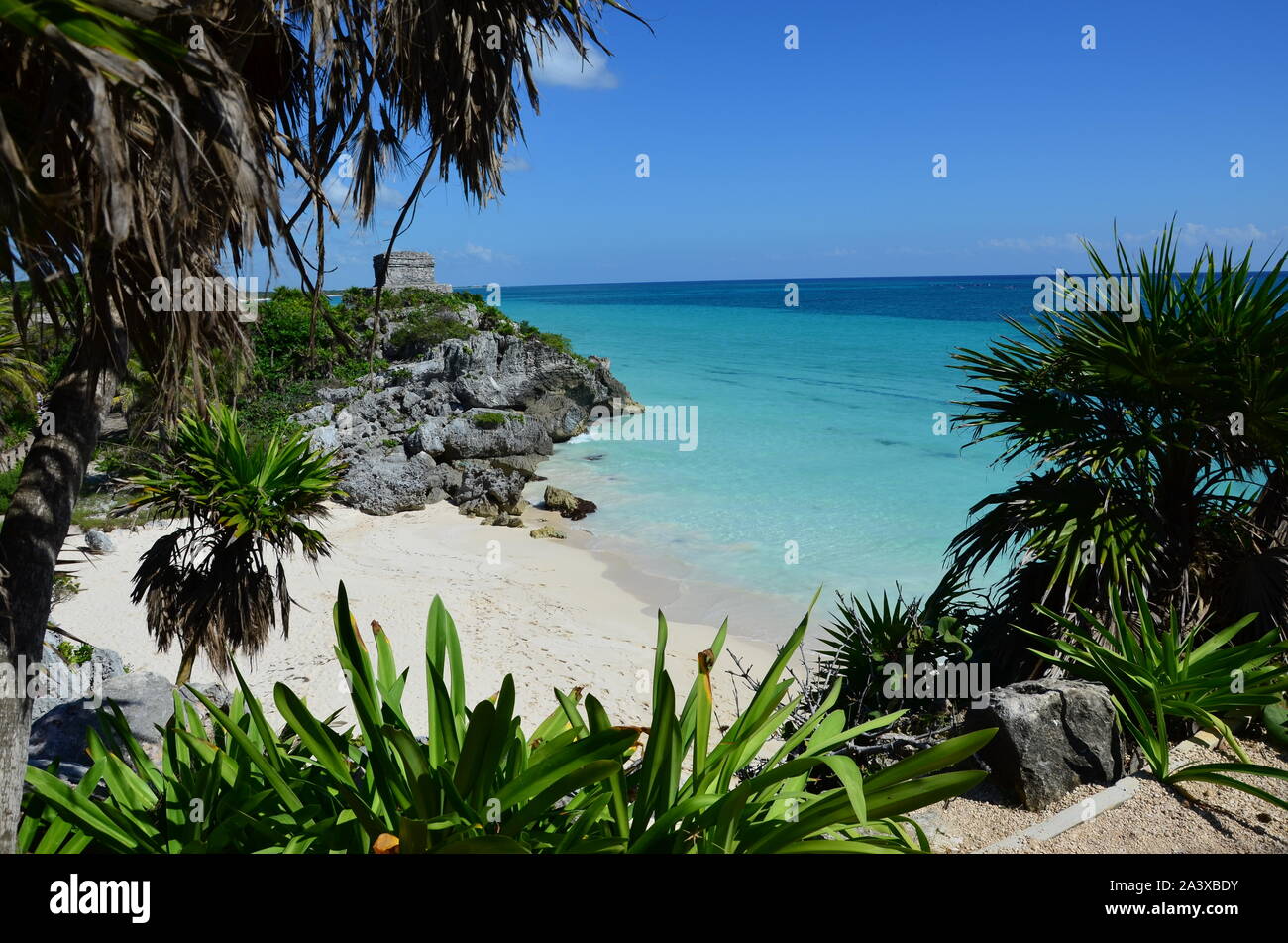 The view of the beach and sea - crystal clear waters of Tulum Stock Photo