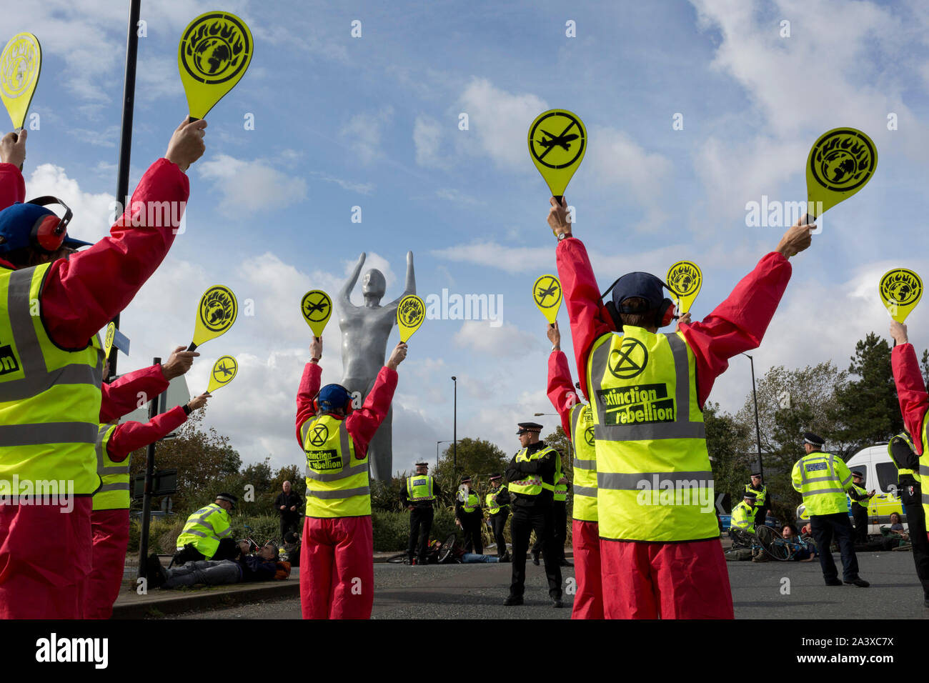 Environmental activist protest about Climate Change during the occupation of City Airport (London's Business Travel hub) in east London, the fourth day of a two-week prolonged worldwide protest by members of Extinction Rebellion, on 10th October 2019, in London, England. Stock Photo