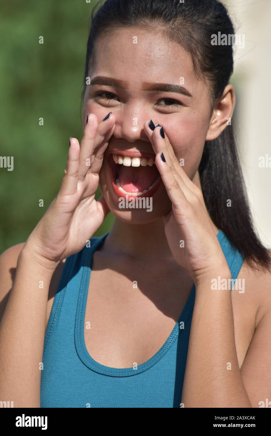 An Asian Female Yelling Stock Photo