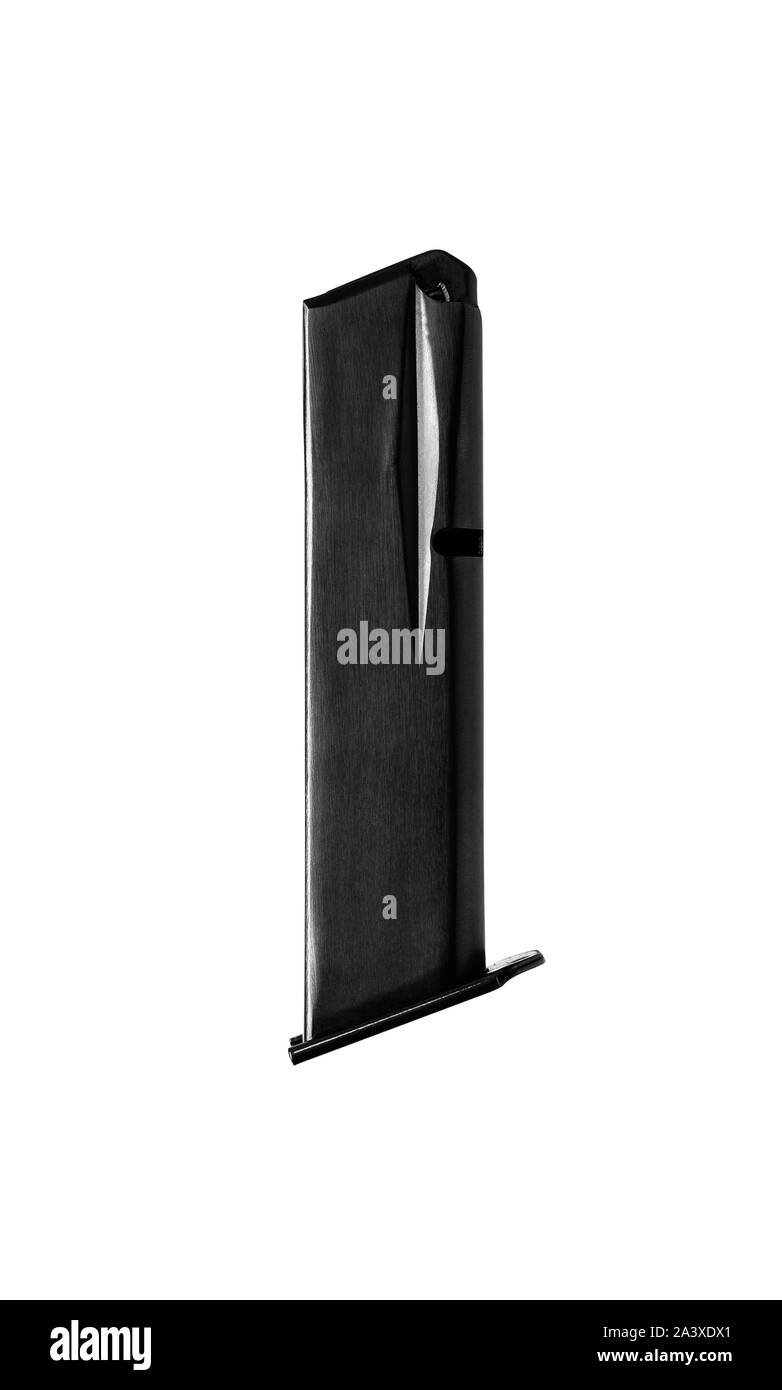 Handgun magazine on white surface. Clip for a modern semi-automatic pistol isolate on a white background. Stock Photo