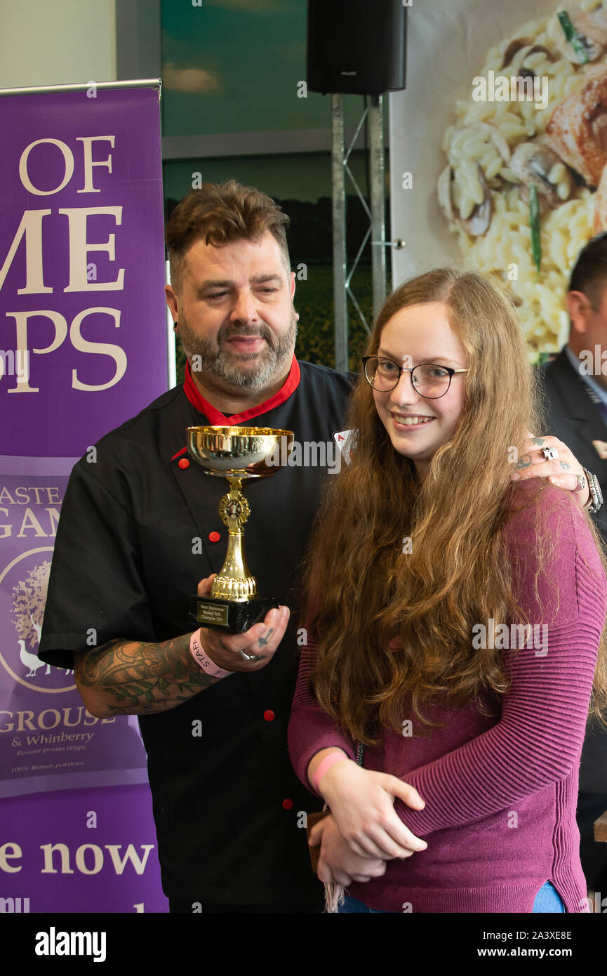 Autumn Racing Weekend & Ascot Beer Festival, Ascot Racecourse, Ascot, Berkshire, UK. 5th October, 2019. Students from Reading College take part in the Ascot Sausage Roll Competition. Credit: Maureen McLean/Alamy Stock Photo