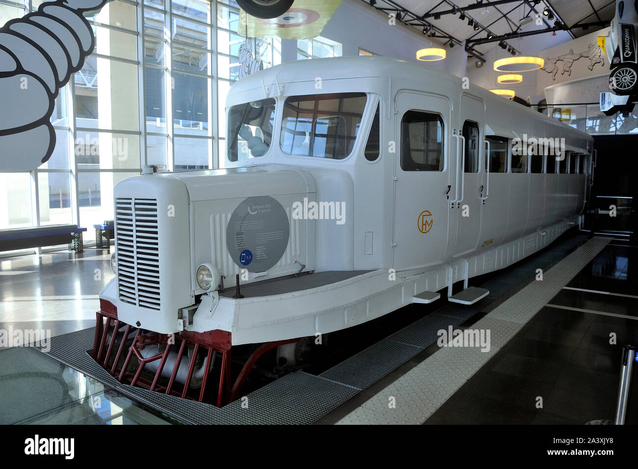 The Micheline invented by Michelin in 1930, the first railcar on display in the lobby of the Michelin museum Stock Photo