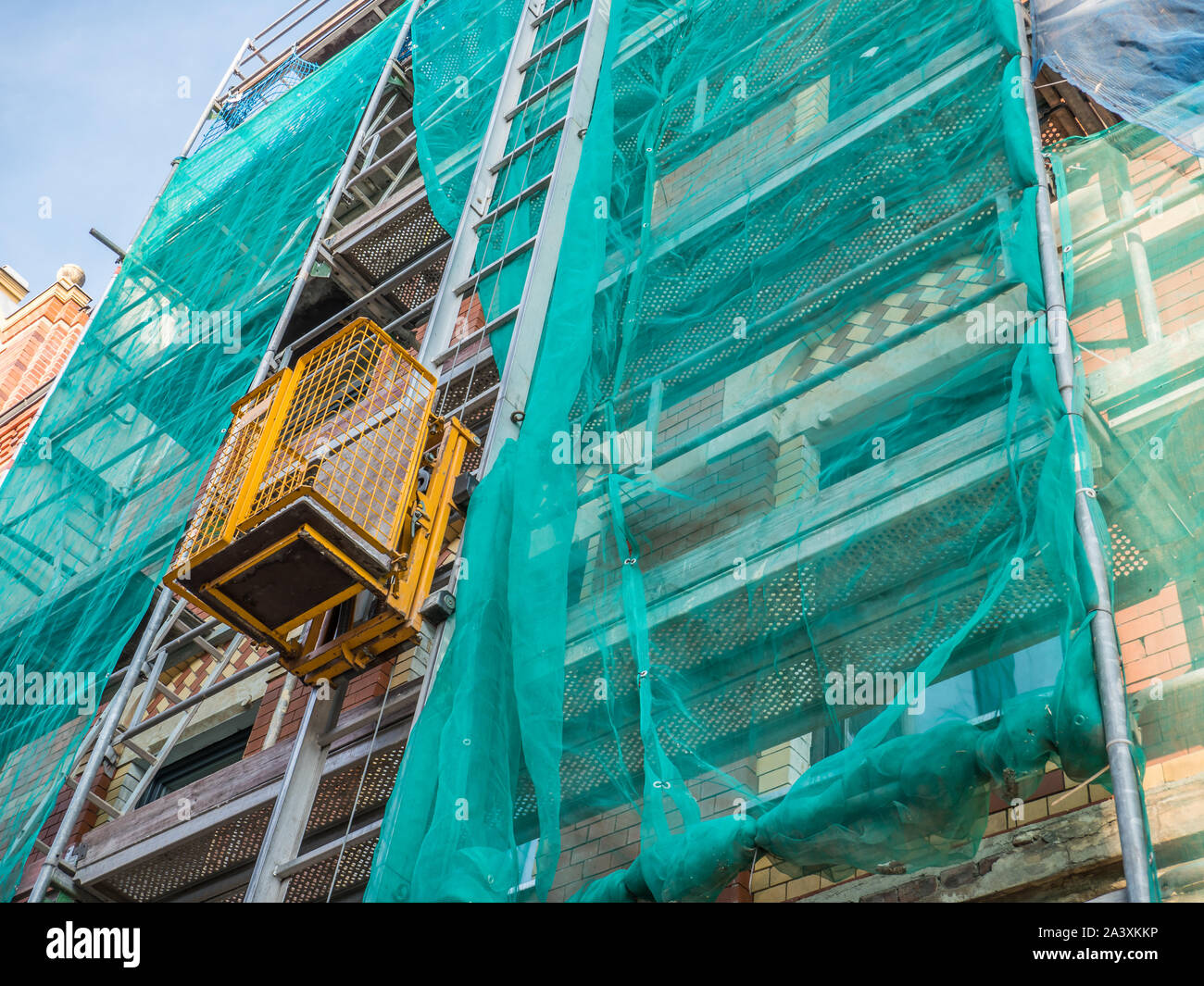 scaffolding with freight elevator Stock Photo