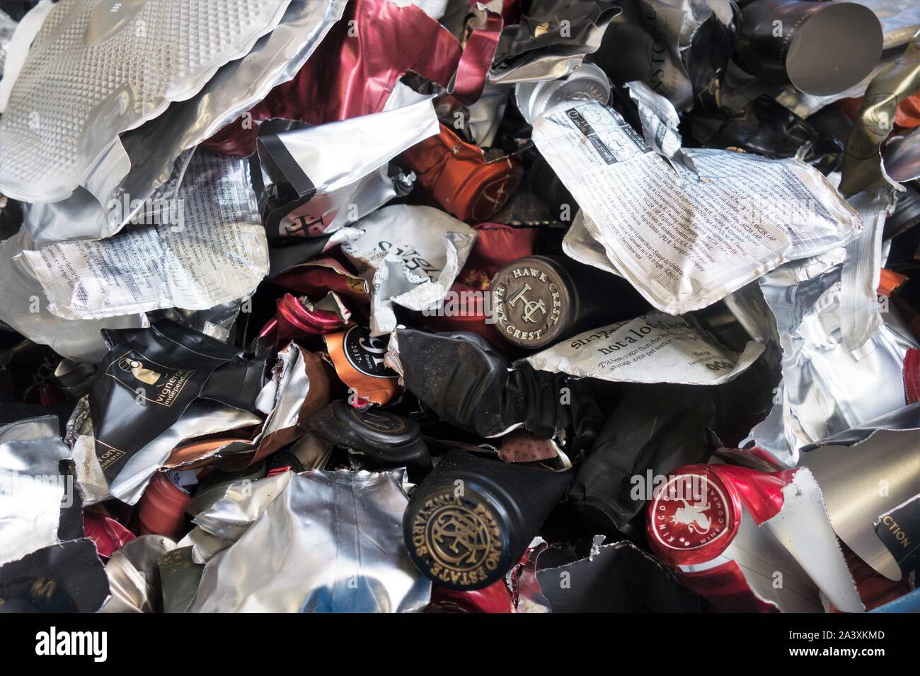 A bin full of wine bottle foil to be recycled, at Bring Recycling