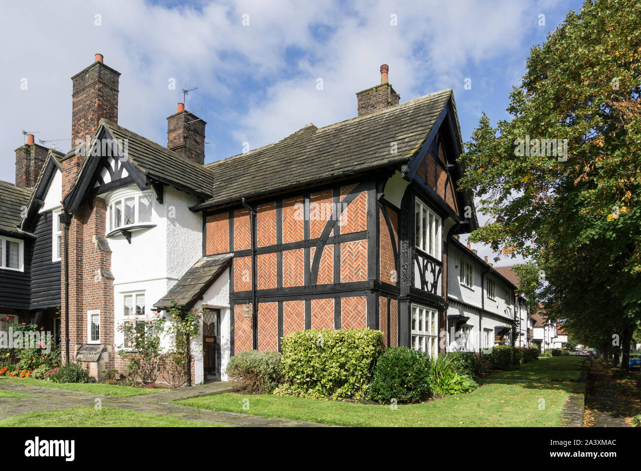 Houses in the model village of Port Sunlight, Wirral, Merseyside, UK; originally built by Lever Bros for their factory workers. Stock Photo