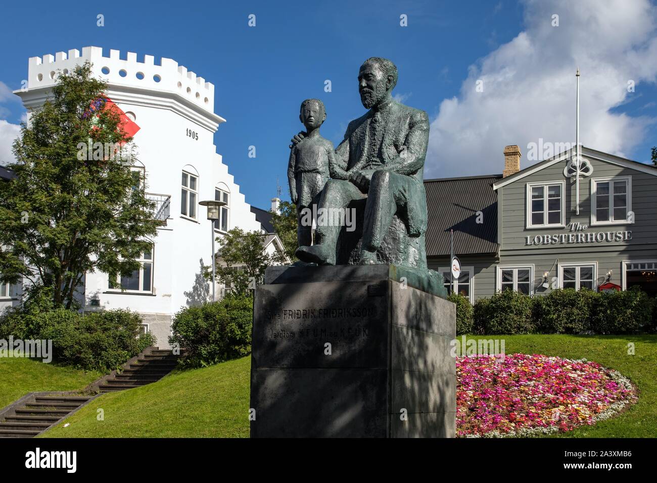 BRONZE STATUE OF FRIDRIK FRIDRIKSSON, ICELANDIC PRIEST, IN FRONT OF THE