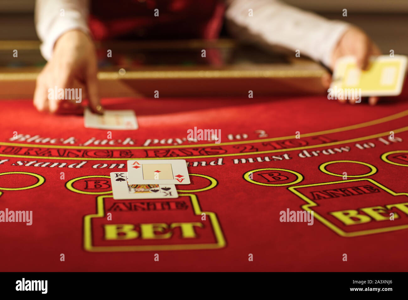 The croupier in the casino does a shuffle of cards Stock Photo Alamy