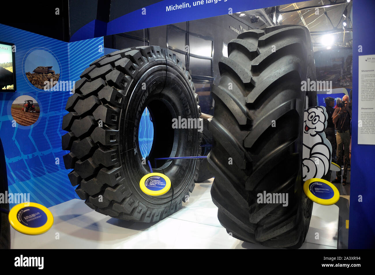 Tires of heavy construction machinery exposed at the exit of the visit of the Michelin Museum in Clermont-Ferrand Stock Photo