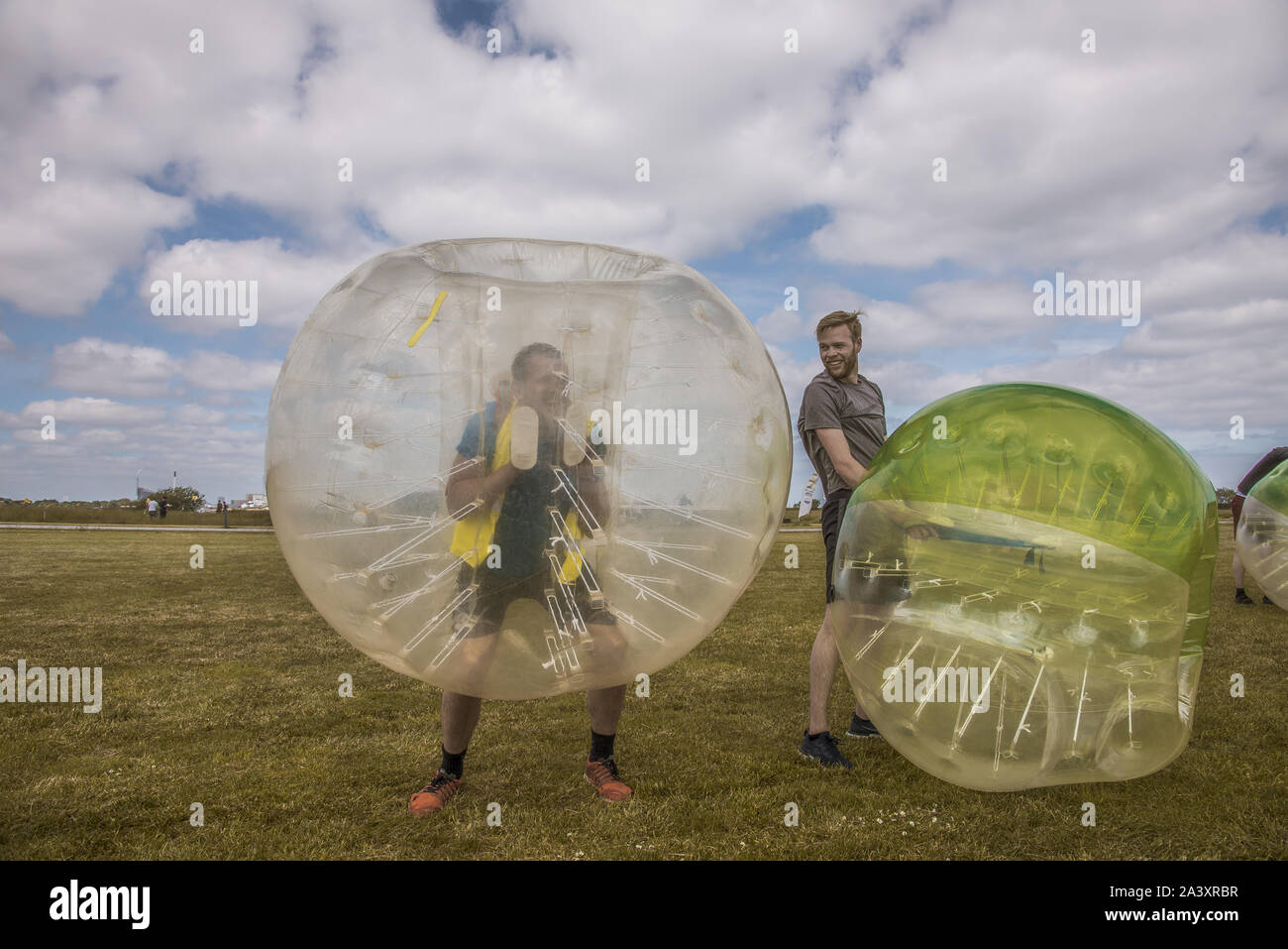 playing soccer in an inflatable bumper ball with a transparent plastic shell, Copenhagen, Denmark, May 25, 2019 Stock Photo