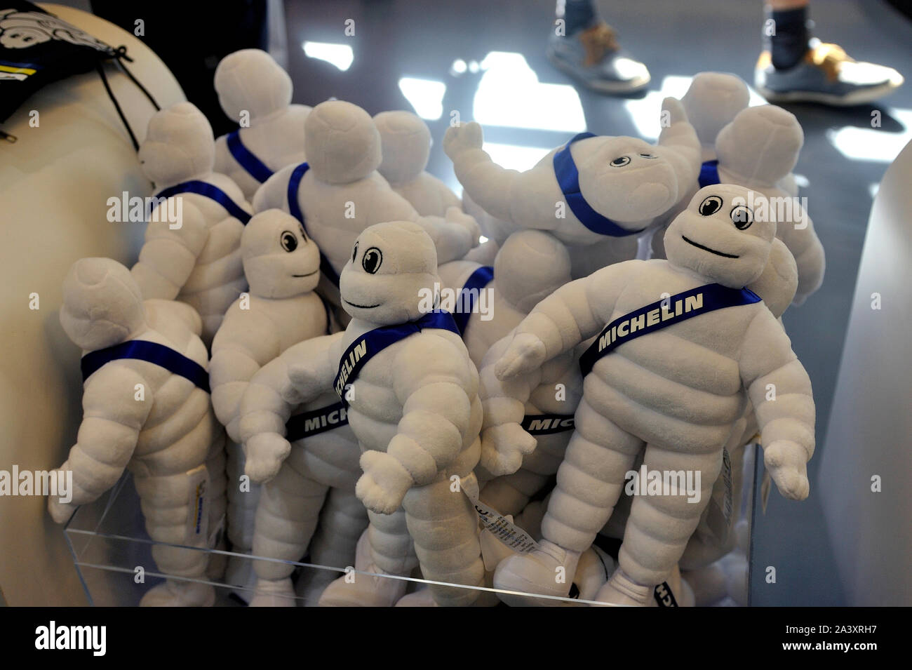 small Bibendum Michelin stuffed toys on sale in the shop at the museum exit Stock Photo