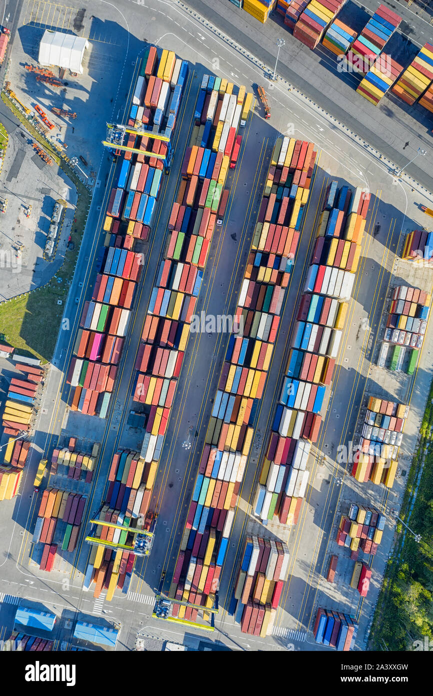 Top aerial view on cargo containers on the container site. Freight transportation. shipping, global trade and logistics theme Stock Photo