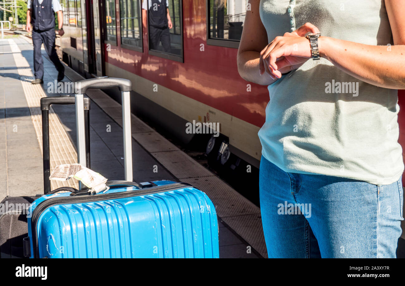 Woman waiting train train hi-res stock photography and images - Alamy