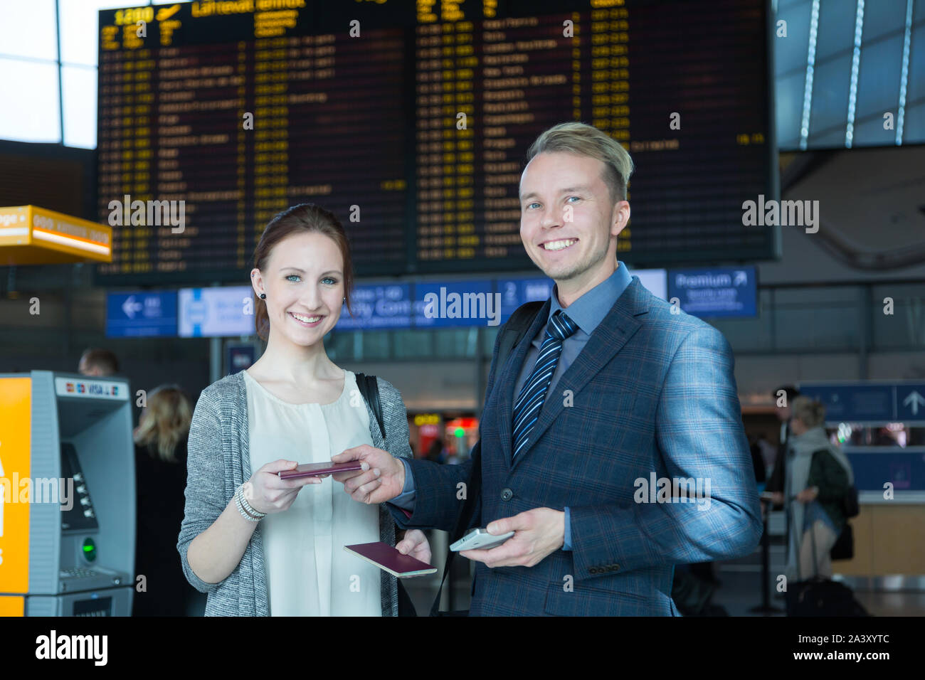 Passengers at the airport Stock Photo - Alamy