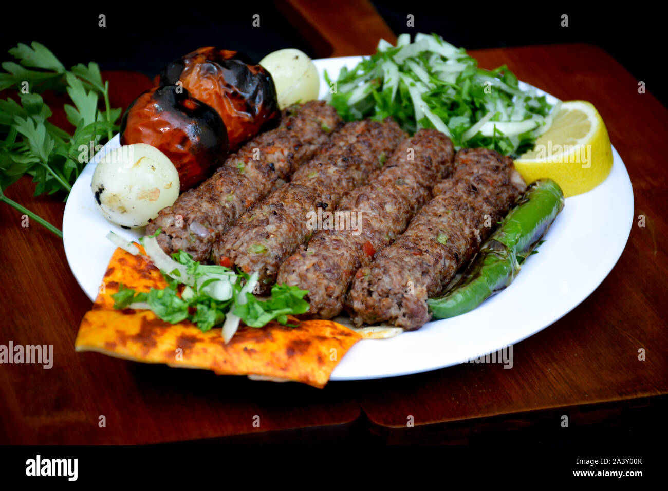 Plate of Traditional arab eastern meal - selections of kebabs Stock Photo