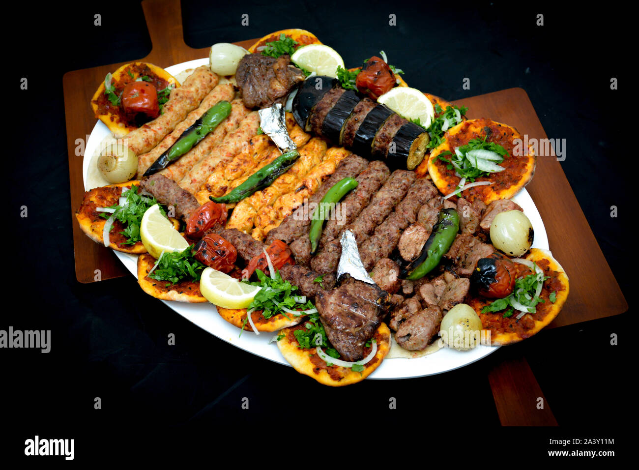 Plate of Traditional arab eastern meal - selections of kebabs Stock Photo