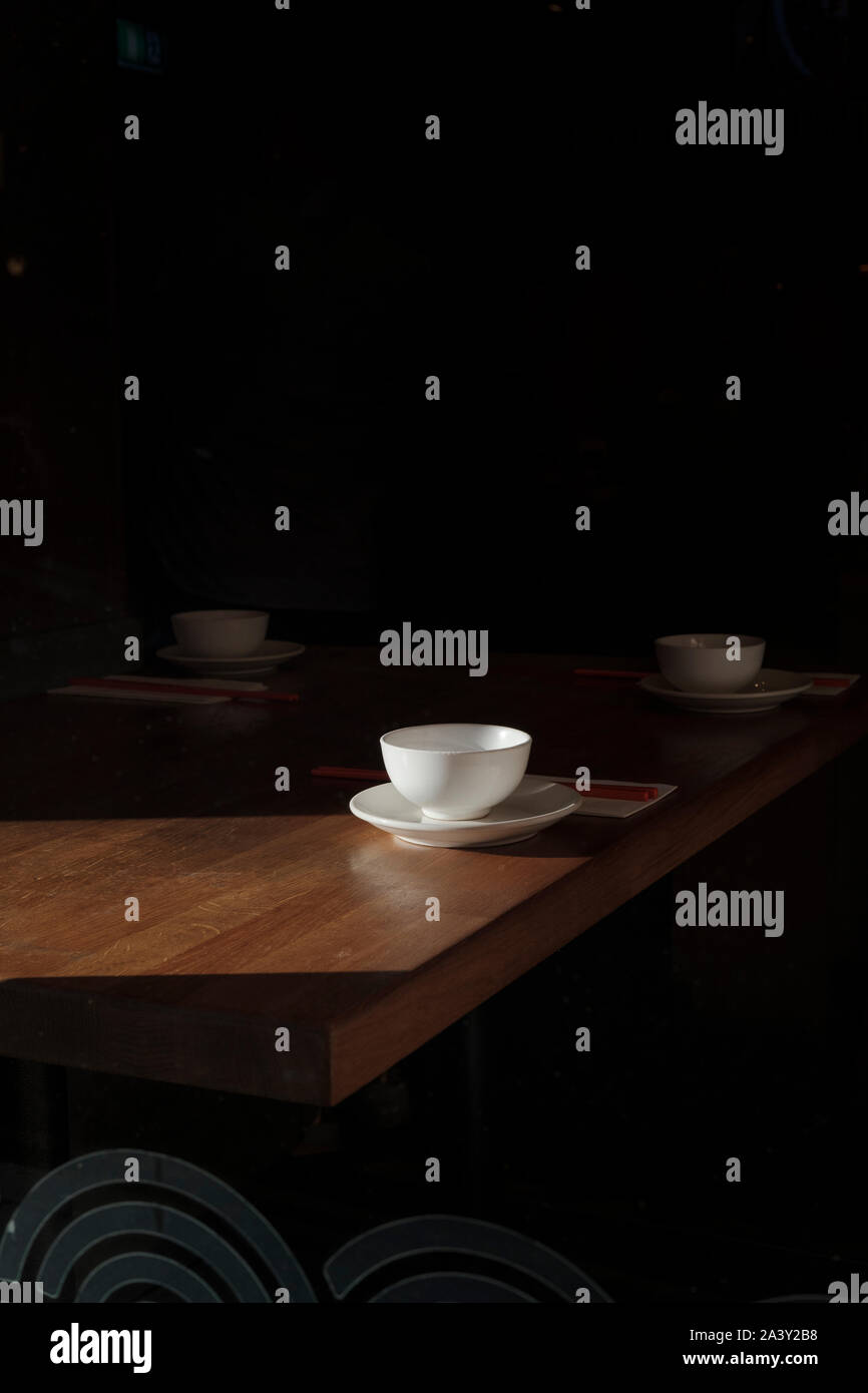 Tea cups on the table- early morning light Stock Photo