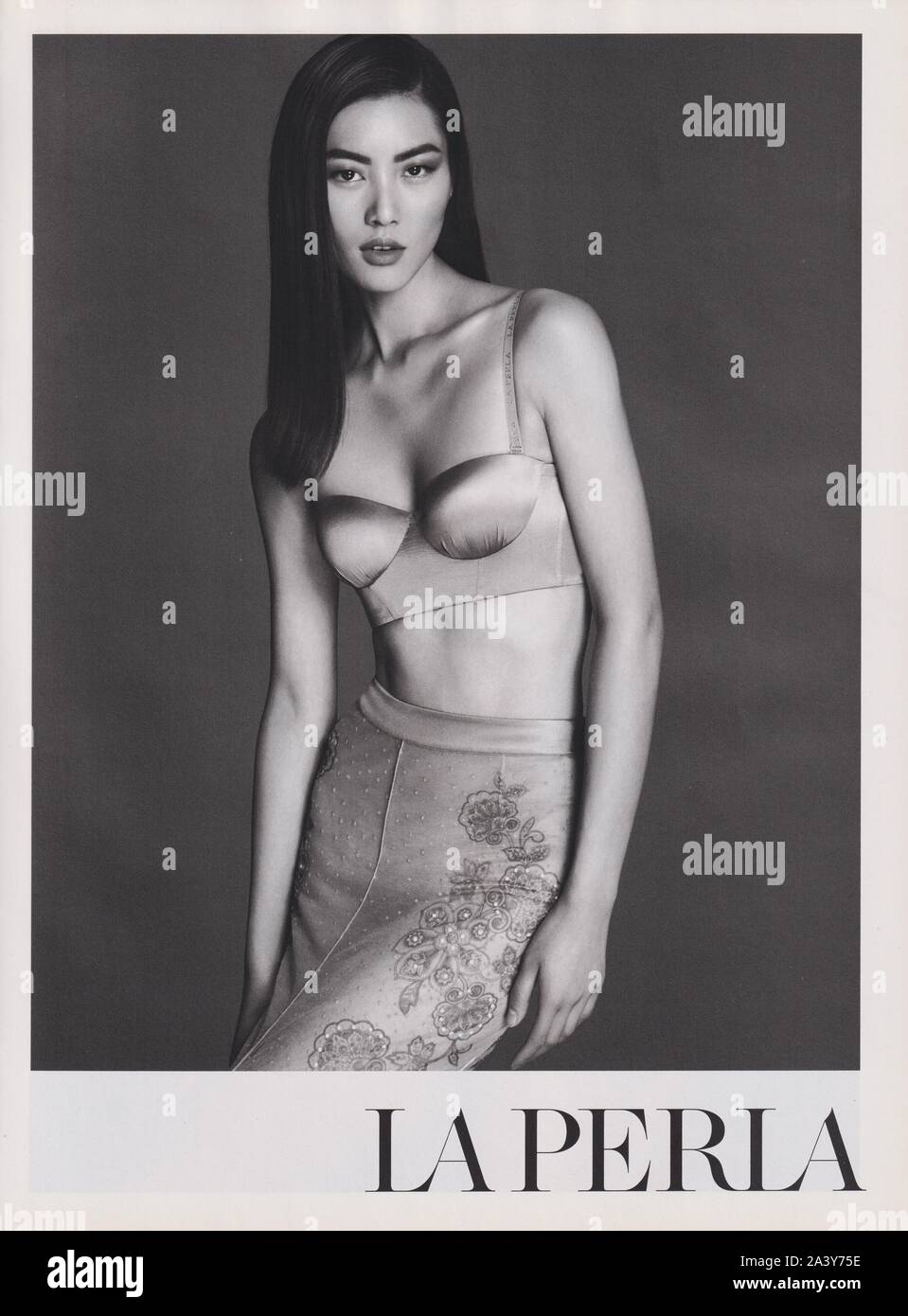 poster advertising La Perla fashion house with Liu Wen in paper magazine  from 2014 year, advertisement, creative La Perla advert from 2010s Stock  Photo - Alamy