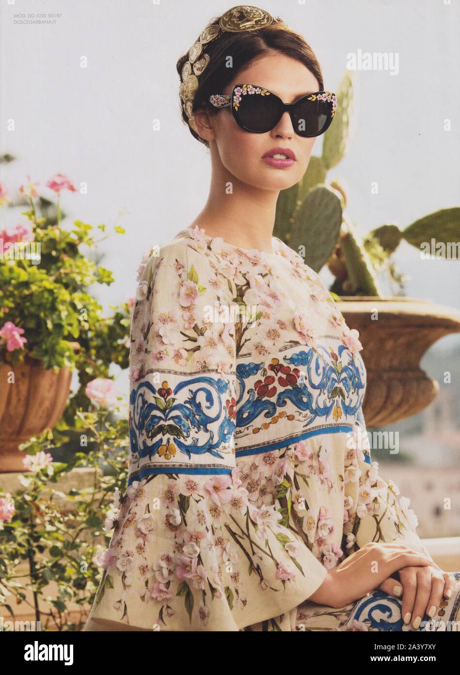 poster advertising Dolce & Gabbana fashion house with Bianca Balti in paper  magazine from 2014, advertisement, creative Dolce & Gabbana 2010s advert  Stock Photo - Alamy