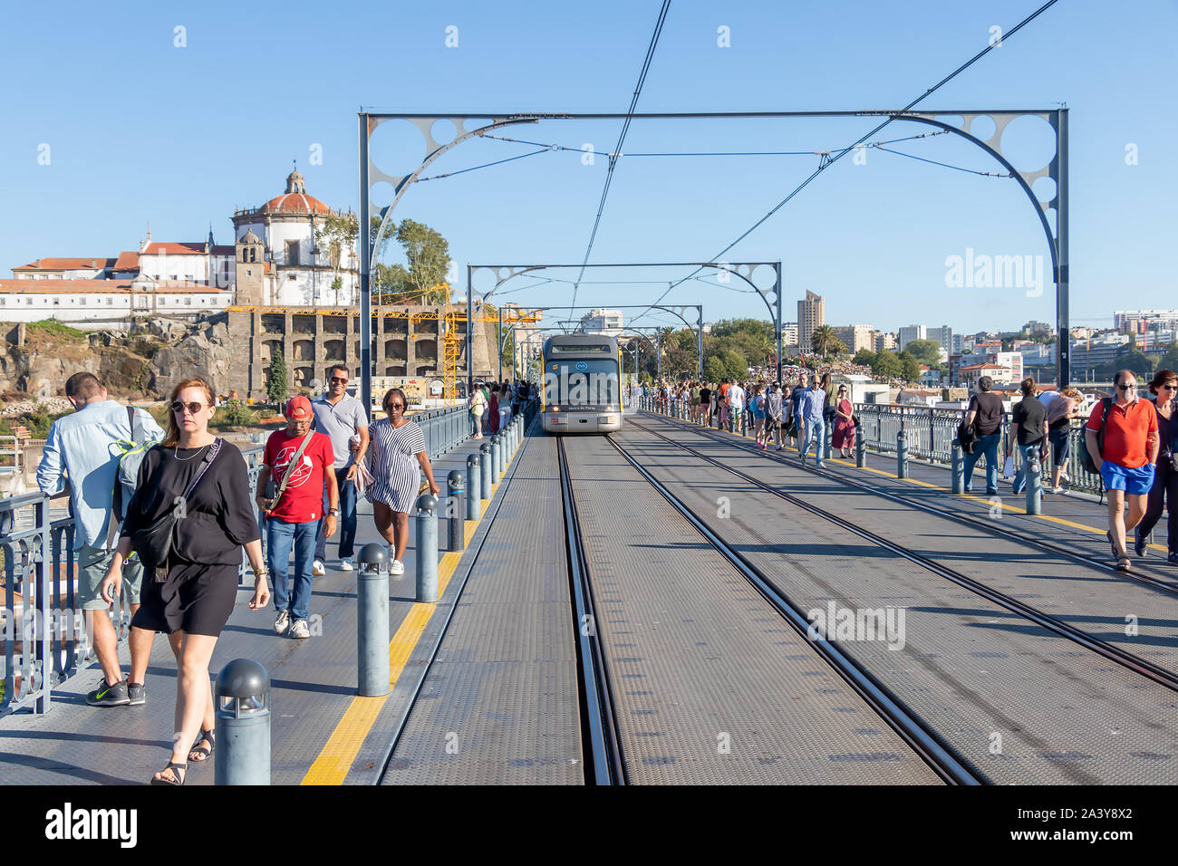 Porto, Portugal, July 19, 2019: View of the metro tram train crossing the Dom Luis I bridge in Porto, Portugal Stock Photo