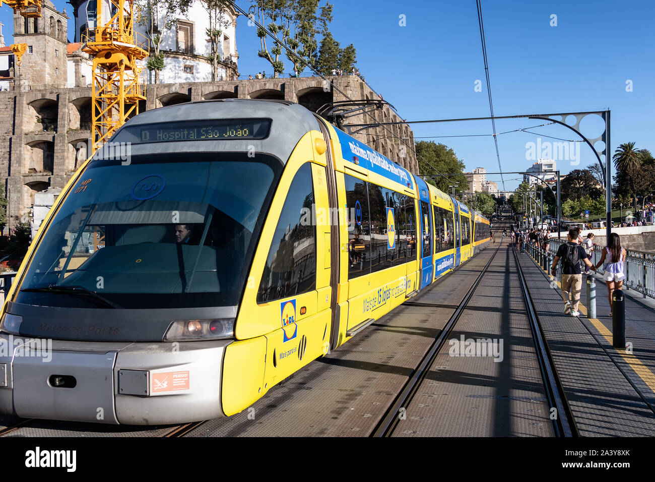 Porto, Portugal, July 19, 2019: View of the metro tram train crossing the Dom Luis I bridge in Porto, Portugal Stock Photo